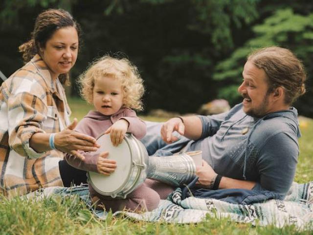 Parents and baby drumming